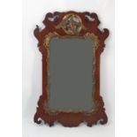 A Georgian design wall mirror, with fret cut decoration, gilt scroll and HoHo bird,