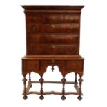 A 18th century chest on stand, fitted with a secret frieze drawer,