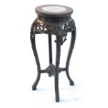 An Antique padouk wood jardiniere stand,