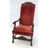 A 17th century style open armchair, with raked back,