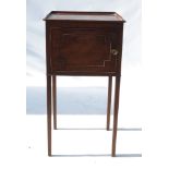 A 19th century mahogany pot cupboard, with moulded door, raised on square legs,