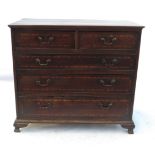 An 18th century red walnut chest, of two short drawers over three long drawers,