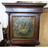 An 18th century oak longcase clock, having a square brass dial, decorated with cherubs,