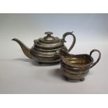 A George III Silver Tea Pot, London 1819, 633g and similar creamer 189g