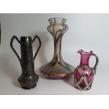 A Silver Overlay Cranberry Glass Jug, vase and Art Deco pewter vase