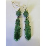 A Pair of Jade Pendant Earrings carved as baluster vases with flowers, 49mm drop