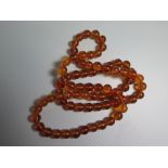 An Amber Bead Necklace, 101.8g
