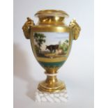 A Nineteenth Century Continental Porcelain Vase decorated with cow in landscape with ram's mask