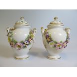 A Pair of Sampson Hancock Derby Vases and Covers with applied floral swags, 12cmFaults