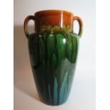 A Linthorpe Pottery Slip Glaze Vase, impressed mark to base and model 750, 33.5cmRepair to rim