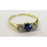 A Sapphire and Diamond Three Stone Ring