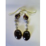 A Pair of Cabochon Garnet and Diamond Pendant Earrings, 52mm drop