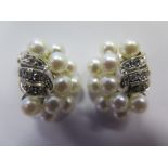 A Pair of Pearl and Diamond Earrings on 14K white