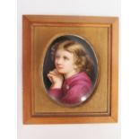 Nineteenth Century Oval Porcelain Plaque depicting young girl, probably French, 12 x 9.5cmBought