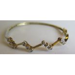 A 9ct Gold and Diamond Hinged Bangle