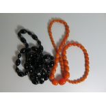 Two Amber Bead Necklaces, 238g