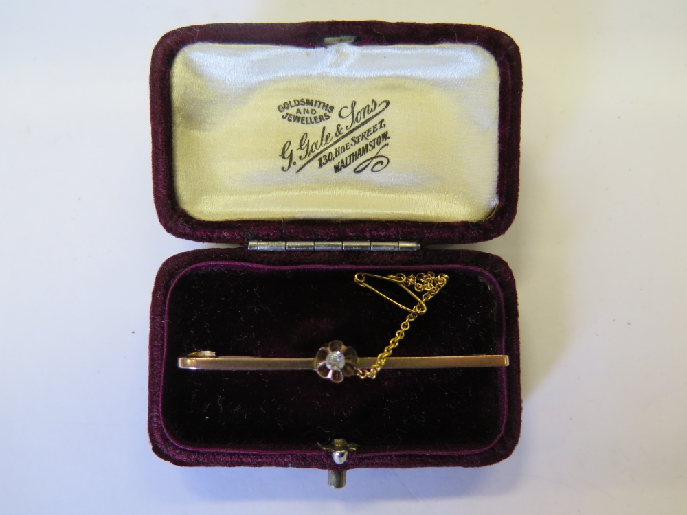 A 9ct Gold and Diamond Bar Brooch