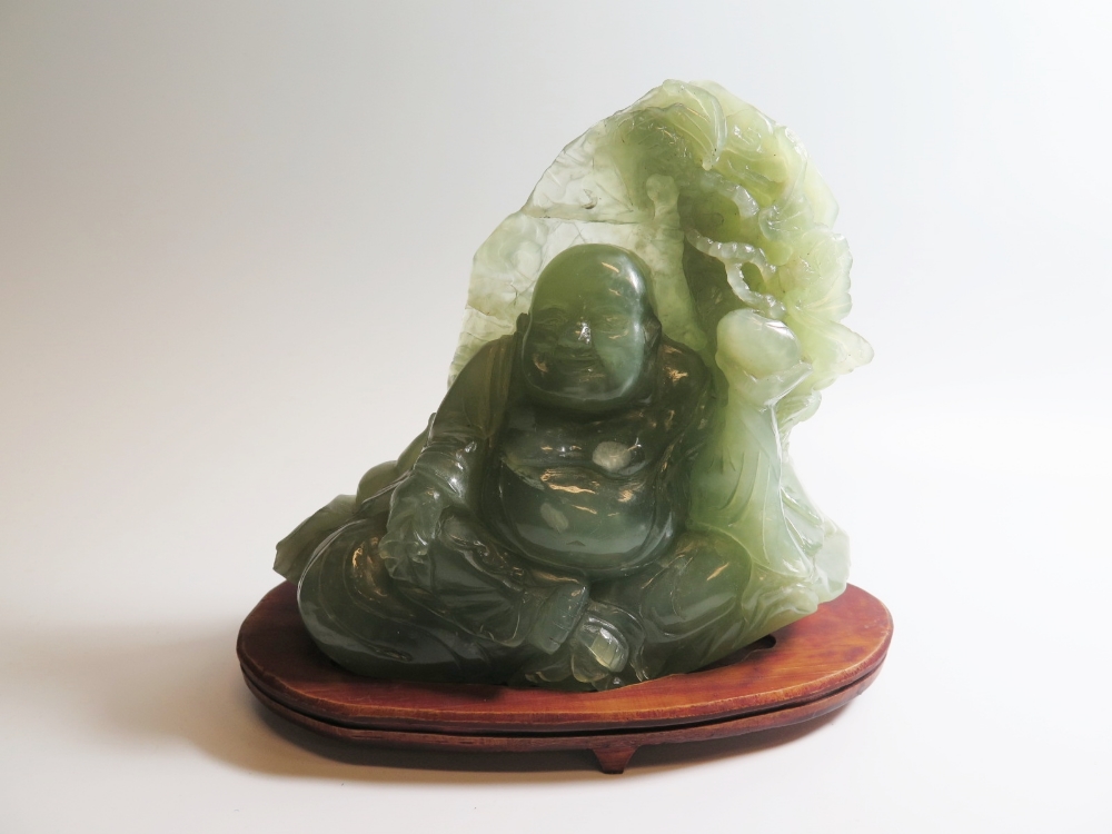 A Large Carved Jadeite Buddha Figure