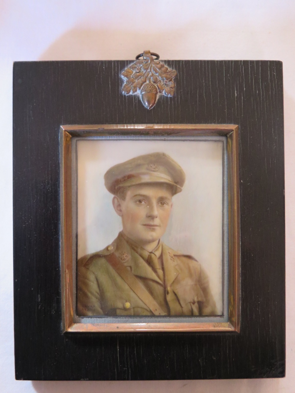 A World War One Portrait Miniature of a young officer, signed Laura Adams