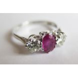 A Burmese Ruby and Diamond Three Stone Ring on 18ct white gold, ruby 0.77 untreated and diamond