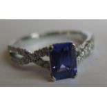 An 18ct Gold Diamond and Tanzanite Ring