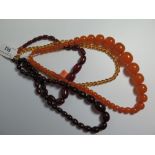 Three Faux Amber Bead Necklaces and one other