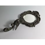 A Bronze Framed Mirror