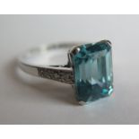 A Blue Zircon and Diamond Shouldered Ring on 18ct white, 5.24ct