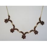 A 9ct Gold and Garnet Necklace