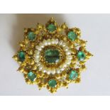 An Emerald and Pearl Brooch, central stone .68ct