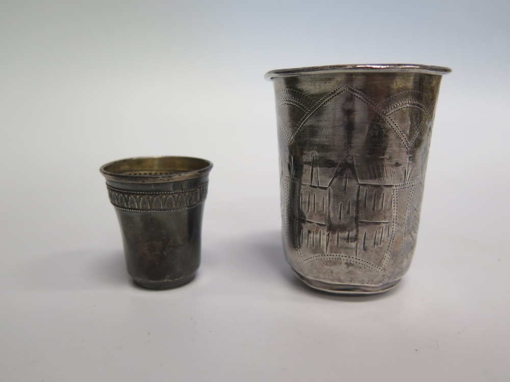 .84 Silver Beaker and silver shot cup