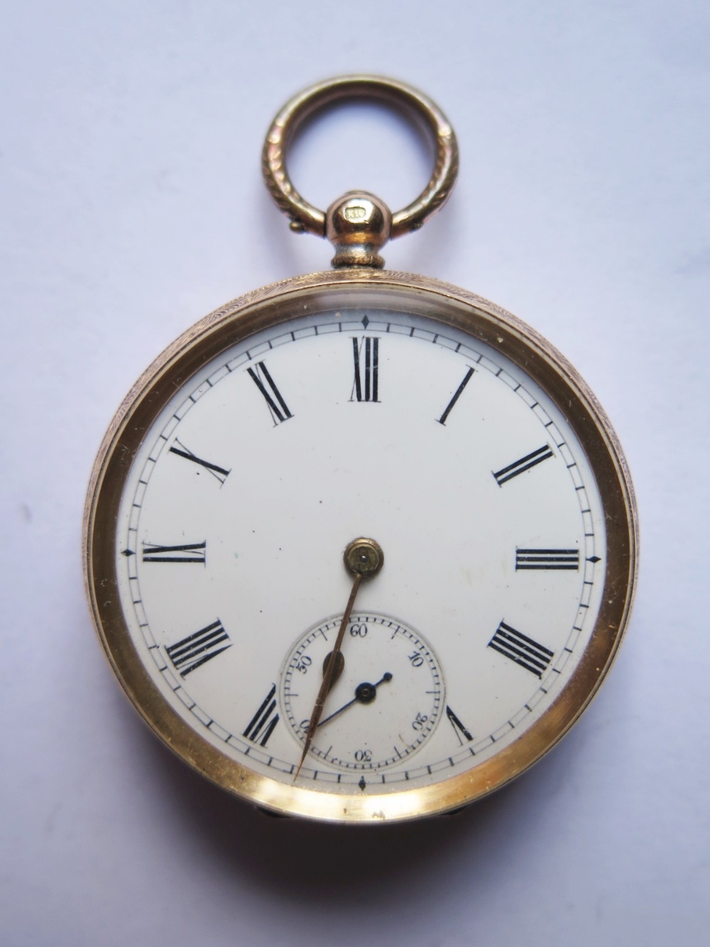 A 14k Gold Ladies Pocket Watch in case, the enamelled dial with subsidiary seconds hand, running