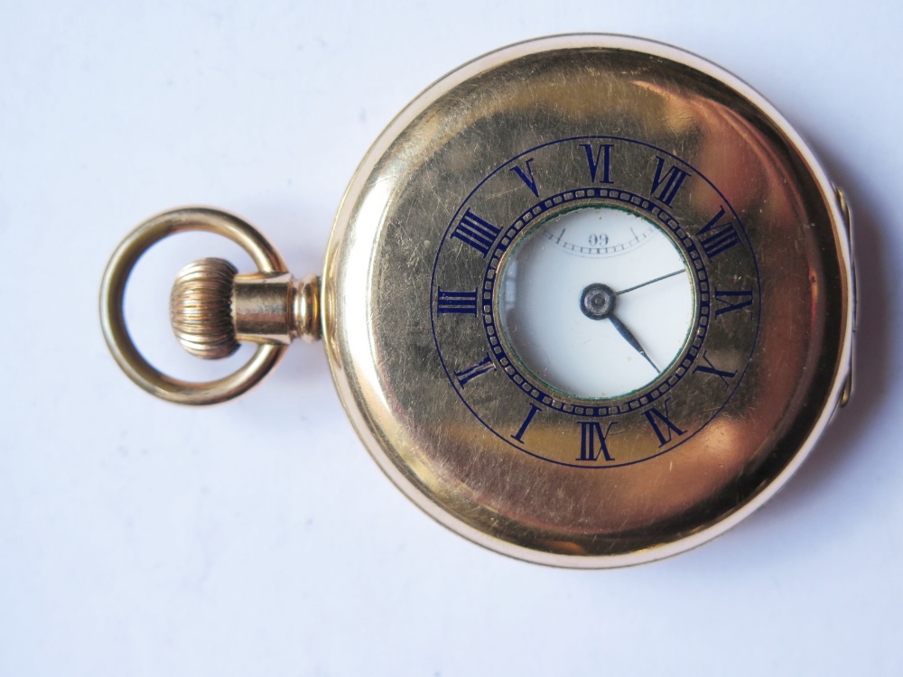 A Keyless Half Hunter Pocket Watch in gold plated case with enamelled dial and Swiss movement,