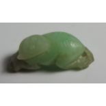 A Jadeite Ojime of a hare and soapstone ojime