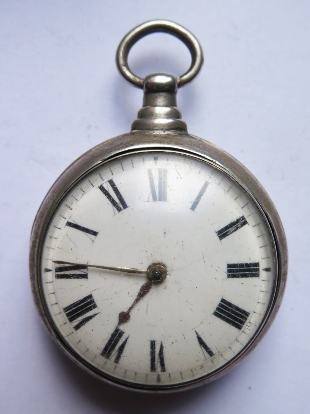 A George III Silver Pair Cased Pocket watch, the chain driven fusee movement signed Thos. Mandle