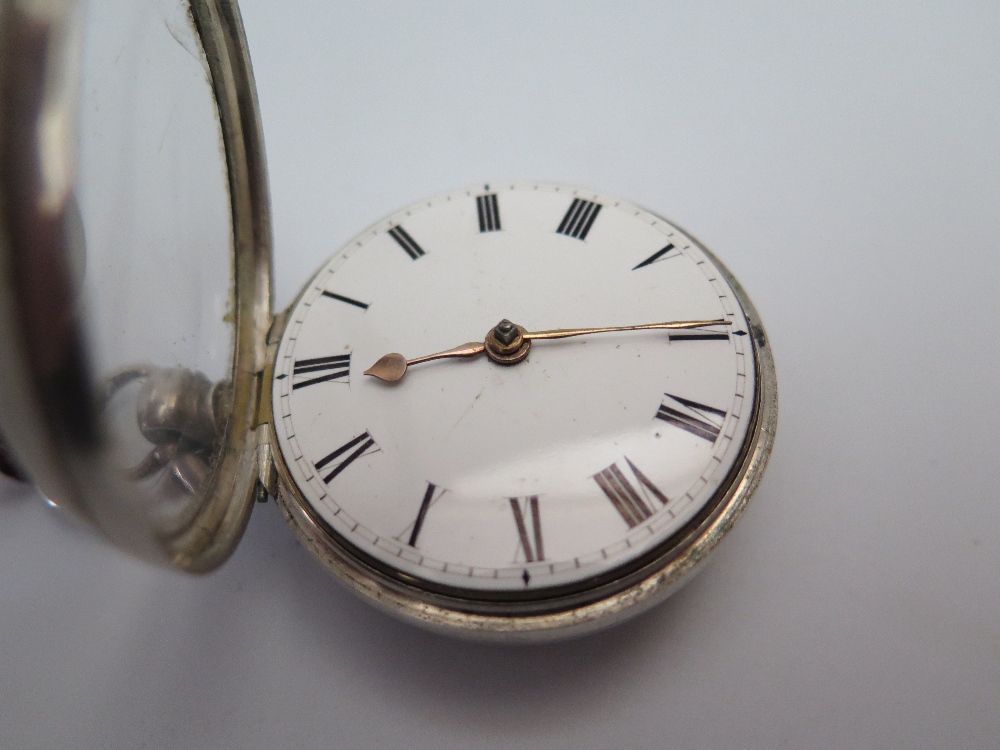 A George IV Silver Pair Cased Pocket Watch, the enamelled dial with Roman numerals, the single chain - Image 3 of 3