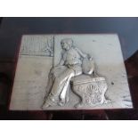 A White Metal Relief Plaque decorated with a lady on a bench 18 x 12cm, F&G