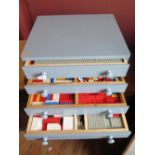 A Large Selection of Lego including train set and purpose built wooden storage drawers