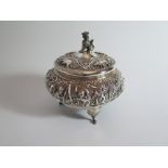 A Burmese Silver Bowl and Cover decorated with various scenes including oxen pulling cart, 12 cm