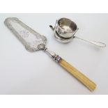 A Nineteenth Century Swiss Silver Cake Slice and plated tea strainer