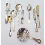 A Selection of Silver and Plated Flatware including white metal strainer