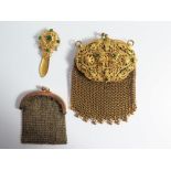 A Costume Mesh Evening Bag with matching clip and one other mesh evening bag in wire box