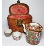 A Nineteenth Century Chinese Cantonese Export Ware Tea Pot with two matching tea bowls in original