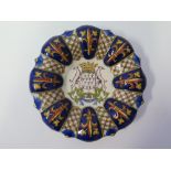 A French Faience Dish decorated with armorial 21.5 cm and hot water plate