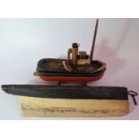 A Wooden Model Wind Up Pilot Boat With Key And Larger Victorian Model with pressed tin plaque to
