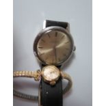 Gent's Steel and Lady's 9ct Gold Universal Wristwatches