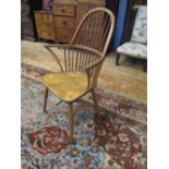 A Nineteenth Century Windsor Chair stamped to the base VR with crown above Produce in Wycombe for