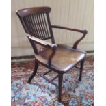 A Nineteenth Century Mahogany Slat Back Varver Chair with turned legs and stretchers