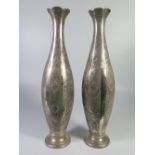 A Pair of Middle Eastern Vases with floral decoration, marked to rim of base, 1239 g, 39 cm