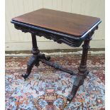 A Nineteenth Century Rosewood Occasional Table with foliate and shell carved frieze on twin turned